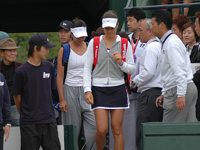 Singles finalists enter into Center Court