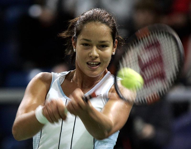 Ana Ivanovic of Serbia and Montenegro plays a backhand at the Zurich Challenge WTA tournament in Kloten