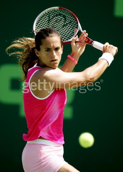 Amelie Mauresmo of France returns to Ana Ivanovic of Serbia during the NASDAQ-100 Open at the Crandon Park Tennis Center on March 30, 2005 in Key Biscayne, Florida. Mauresmo won in straight sets. 