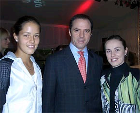 ZURICH : Ana Ivanovic (left) and Martina Hingis (right) pose for a photo with a representative of Rado at a prize drawing on Wednesday.