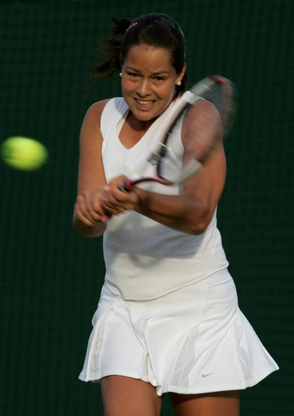 Ana Ivanovic  returns a ball  during  her first round match against Vera Douchevina from Russia, which she won  6-4 6-3.