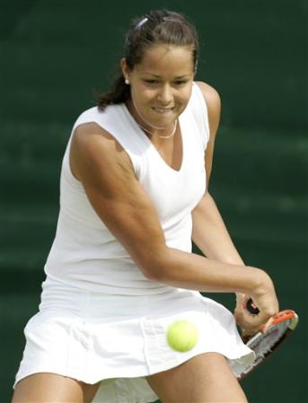 Ana Ivanovic of Serbia and Montenegro returns on her way to defeating France's Stephanie Foretz, in their Women's Singles, second round match, at Wimbledon, Thursday June 23