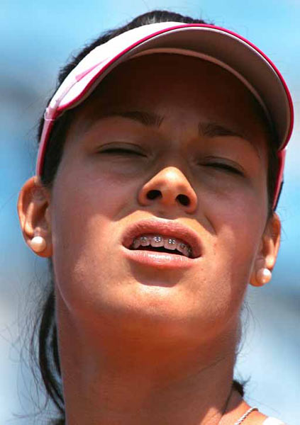 Ana Ivanovic reacts during her tennis match against Switzerland's Patty Schnyder at the Italian Masters tennis tournament in Rome May 12, 2005. Schnyder won the match 6-3 6-2