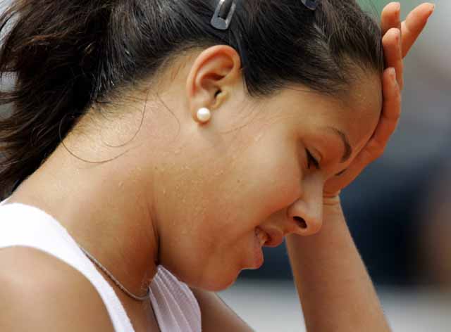 Ana Ivanovic reacts after loosing against Russian Nadia Petrova after their quarter final match of the tennis French Open at Roland Garros, 31 May 2005 in Paris. Petrova won 6-2, 6-2