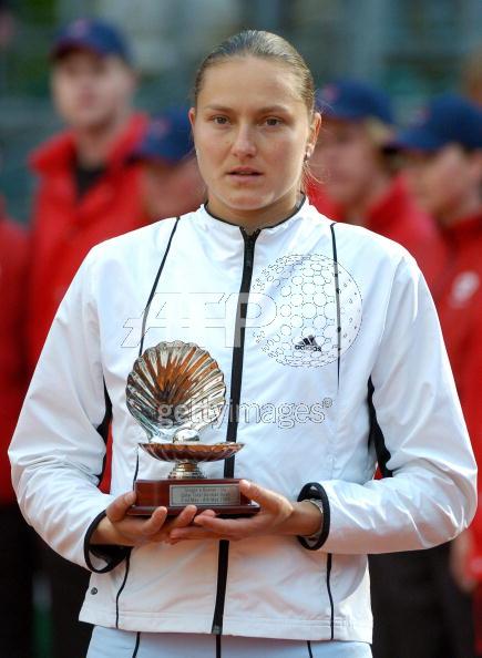 Russia's Nadia Petrova presents her second place trophy of the WTA German Tennis Open in Berlin 08 May 2005. She was defeated in the final match by Belgium's Justine Henin-Hardenne 6-3, 4-6, 6-3