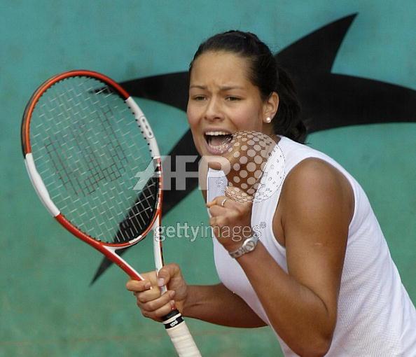 Ana Ivanovic of Serbia jubilates after winning against Francesca Schiavone of Italy during the fourth round match of the tennis French Open at Roland Garros, 30 May 2005 in Paris. Ivanovic won 6-4, 6-7(3), 6-3