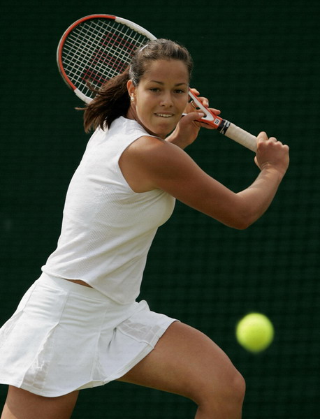 Ana Ivanovic of Serbia & Montenegro in action against Stephanie Foretz of France during the fourth day of the Wimbledon Lawn Tennis Championship on June 23, 2005 at the All England Lawn Tennis and Croquet Club in London. 