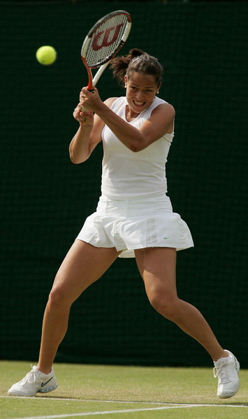 Ana Ivanovic of Serbia & Montenegro in action against Stephanie Foretz of France during the fourth day of the Wimbledon Lawn Tennis Championship on June 23, 2005 at the All England Lawn Tennis and Croquet Club in London. 