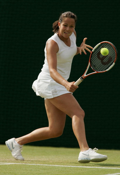 Ana Ivanovic of Serbia & Montenegro in action against Stephanie Foretz of France during the fourth day of the Wimbledon Lawn Tennis Championship on June 23, 2005 at the All England Lawn Tennis and Croquet Club in London. 