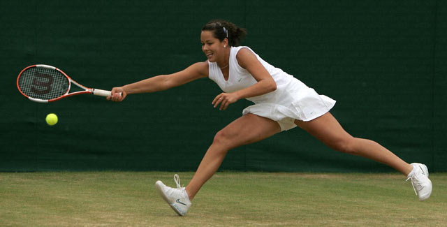 Ana Ivanovic of Serbia & Montenegro in action against Mary Pierce of France during the sixth day of the Wimbledon Lawn Tennis Championship on June 25, 2005 at the All England Lawn Tennis and Croquet Club in London