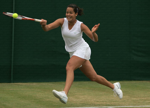 Ana Ivanovic of Serbia & Montenegro in action against Mary Pierce of France during the sixth day of the Wimbledon Lawn Tennis Championship on June 25, 2005 at the All England Lawn Tennis and Croquet Club in London