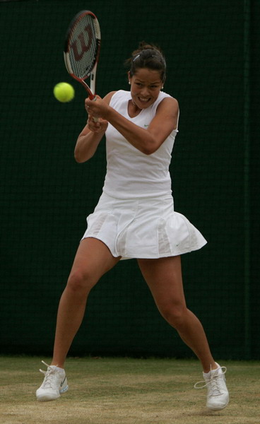 Ana Ivanovic of Serbia & Montenegro in action against Mary Pierce of France during the sixth day of the Wimbledon Lawn Tennis Championship on June 25, 2005 at the All England Lawn Tennis and Croquet Club in London