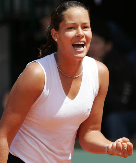 Ana Ivanovic reacts as she defeats Italy's Francesca Schiavone during their fourth round match of the French Open tennis tournament at the Roland Garros stadium, Monday May 30, 2005 in Paris.