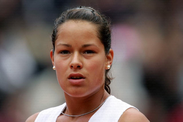 Serbia and Montenegros Ana Ivanovic, the number 29 seed, reacts during her match against Italys Francesca Schiavone, the number 22 seed, in the French Open tennis tournament at the Roland Garros stadium May 30, 2005