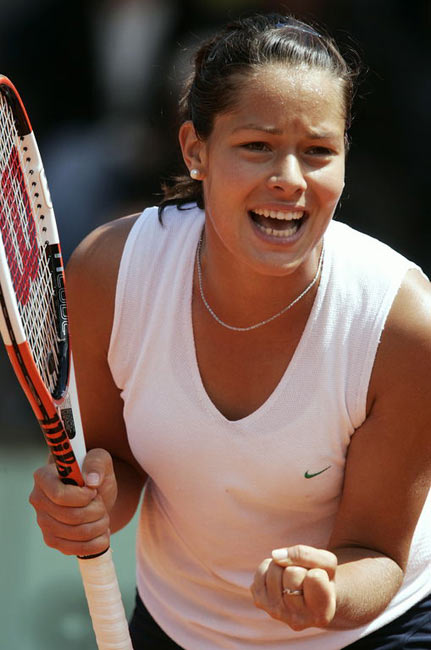 Ana Ivanovic reacts as she defeats Italy's Francesca Schiavone during their fourth round match of the French Open tennis tournament at the Roland Garros stadium, Monday May 30, 2005 in Paris.