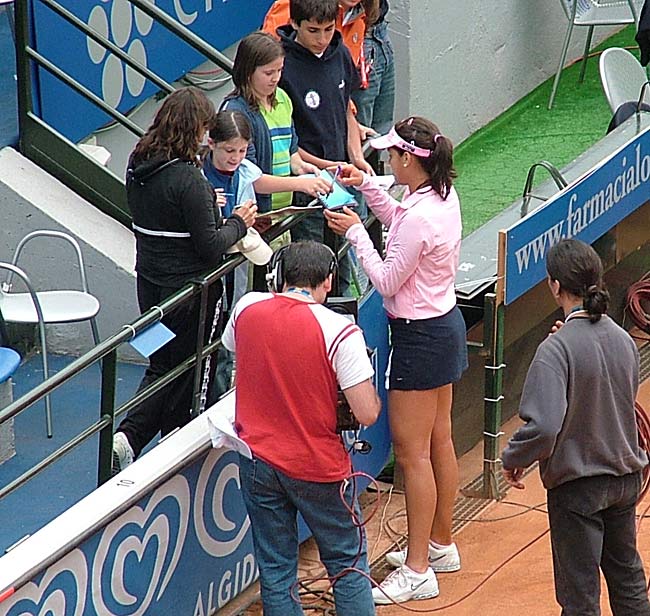 Ana Ivanovic of Serbia and Montenegro signs  for a fan during day two of the Italian Masters Tennis at The Foro Italico on May 10, 2005 in Rome