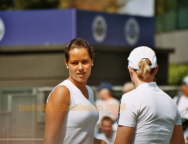 Ana Ivanovic  and  Tina Krizan in the second round match in doubles against Eleni Daniilidou and Nicole Pratt   on June 24, 2005 at the All England Lawn Tennis and Croquet Club in London.