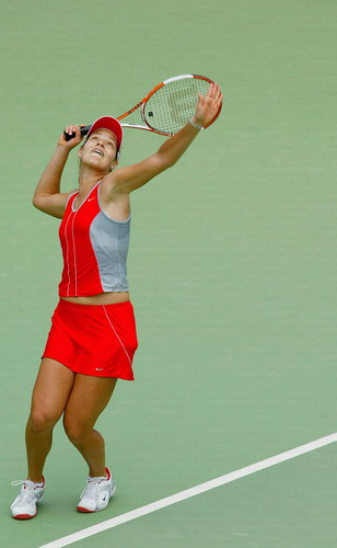 Ana Ivanovic won her first WTA Tour title Saturday with a 7-5, 6-1 win over Melinda Czink at the Canberra Classic.