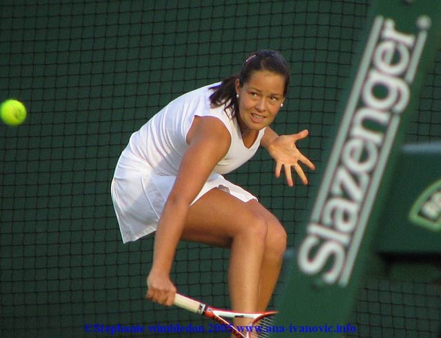 Ana Ivanovic  in action against Vera Douchevina of Russia during the second day of the Wimbledon Lawn Tennis Championship on June 21, 2005 at the All England Lawn Tennis and Croquet Club in London. Ana won 6:4  6:3.