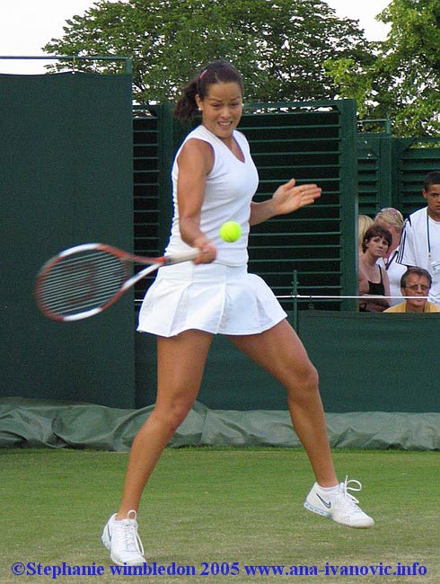 Ana Ivanovic  in action against Vera Douchevina of Russia during the second day of the Wimbledon Lawn Tennis Championship on June 21, 2005 at the All England Lawn Tennis and Croquet Club in London. Ana won 6:4  6:3.