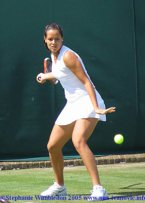 Ana Ivanovic  in action during  the first round match in doubles against Flavia Pennetta and Francesca Schiavone   from Italy on June 22, 2005 at the All England Lawn Tennis and Croquet Club in London. Ana  and  Tina Krizan won 6:2 6:4 .