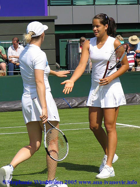 Ana Ivanovic  and  Tina Krizan in the first round match in doubles against Flavia Pennetta and Francesca Schiavone   from Italy on June 22, 2005 at the All England Lawn Tennis and Croquet Club in London.