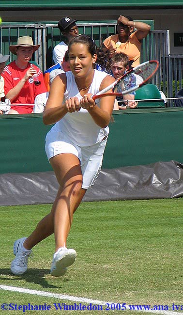 Ana Ivanovic  in action during  the first round match in doubles against Flavia Pennetta and Francesca Schiavone   from Italy on June 22, 2005 at the All England Lawn Tennis and Croquet Club in London. Ana  and  Tina Krizan won 6:2 6:4 .