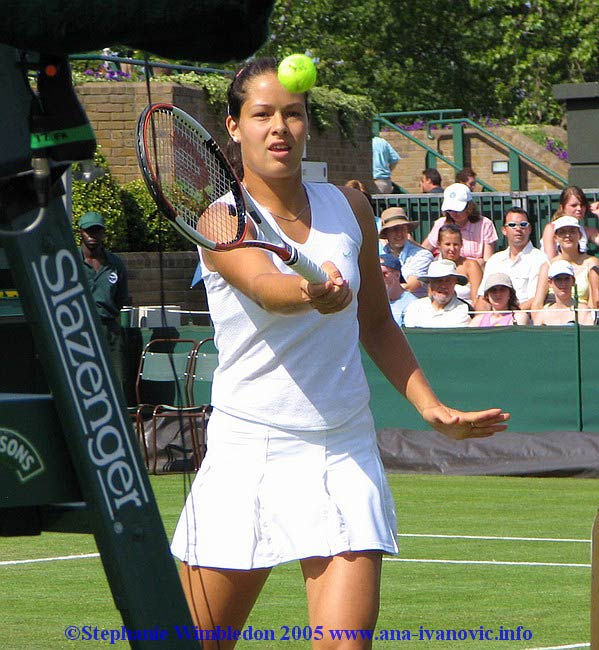 Ana Ivanovic  in action during  the first round match in doubles against Flavia Pennetta and Francesca Schiavone   from Italy on June 22, 2005 at the All England Lawn Tennis and Croquet Club in London. Ana  and  Tina Krizan won 6:2 6:4 .