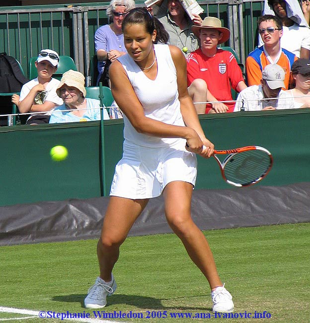 Ana Ivanovic  in action during  the first round match in doubles against Flavia Pennetta and Francesca Schiavone   from Italy on June 22, 2005 at the All England Lawn Tennis and Croquet Club in London. Ana  and  Tina Krizan won 6:2 6:4 .