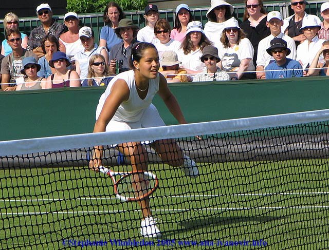 Ana Ivanovic  in action during  the first round match in doubles against Flavia Pennetta and Francesca Schiavone   from Italy on June 22, 2005 at the All England Lawn Tennis and Croquet Club in London. Ana  and  Tina Krizan won 6:2 6:4 .