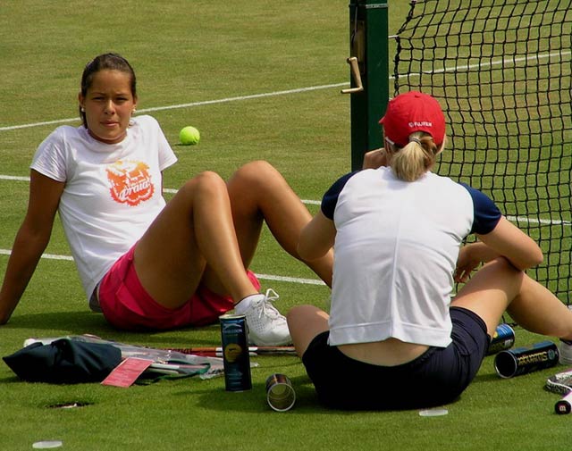 Ana Ivanovic and  Tina Krizan  on practice before beginning of Wimbledon Lawn Tennis Championship on June 2005