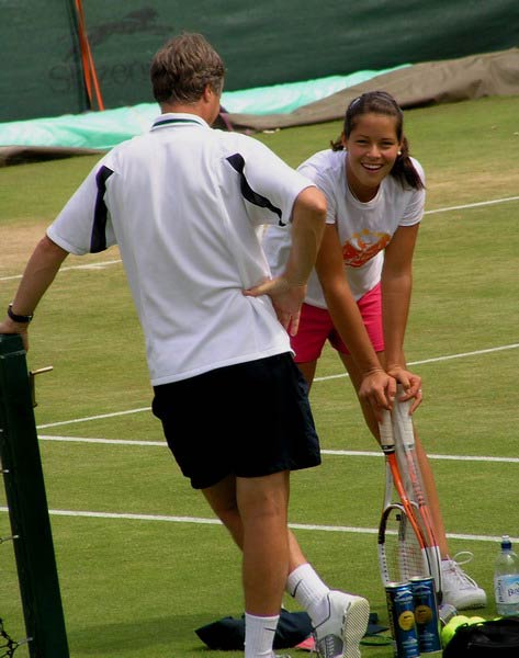 Ana Ivanovic  and her coach Zoltan Kuharsky on practice before beginning of Wimbledon Lawn Tennis Championship on June 2005