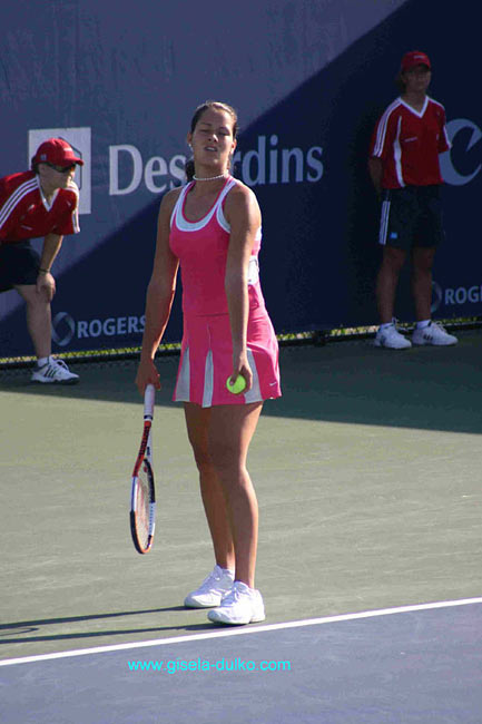 Ana Ivanovic of Serbia on service tin the match  against Tathiana Garbin of Italy in the first round at the Sony Ericsson WTA Tour Rogers Cup tennis tournament August 16, 2005 at the Rexall Centre in Toronto, Canada