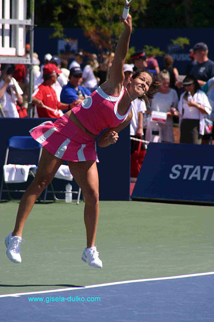 Ana Ivanovic of Serbia on service tin the match  against Tathiana Garbin of Italy in the first round at the Sony Ericsson WTA Tour Rogers Cup tennis tournament August 16, 2005 at the Rexall Centre in Toronto, Canada