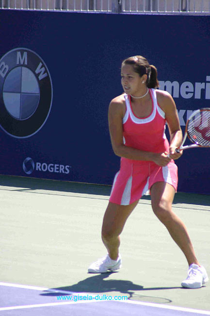 Ana Ivanovic of Serbia plays a backhand against Tathiana Garbin of Italy in the first round at the Sony Ericsson WTA Tour Rogers Cup tennis tournament August 16, 2005 at the Rexall Centre in Toronto, Canada