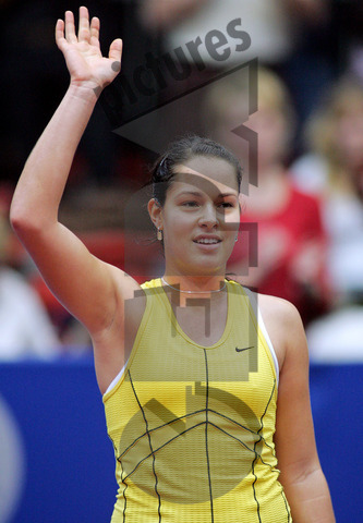 Ana Ivanovic celebrates her win Tamira Paszek of Austria during their Linz Open second round tennis match in Linz October 27, 2005. Ivanovic won 7-5 6-1.