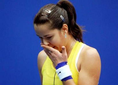 Ana Ivanovic reacts after losing a point to Switzerland's Patty Schnyder during their Linz Open semi-final tennis match in Linz, Austria October 29, 2005. Schnyder won the match 7-5 6-2. 