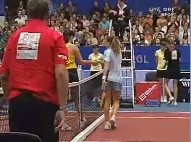 Ana Ivanovic and Patty Schnyder from Switzerland leaves the court after semifinal match of WTA Generali Ladies Open in Linz, 29 October 2005 