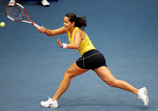 Ana Ivanovic returns the ball to Tatiana Golovin from France in their quarterfinal match at the WTA tennis tournament in Linz, Austria on Friday, Oct. 28, 2005. 