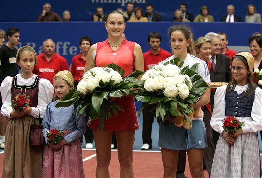 Nadia Petrova from Russia, center left, stands alongside Patty Schnyder from Switzerland after the WTA Generali Ladies tennis tournament in Linz, Austria, Sunday, Oct. 30, 2005. 