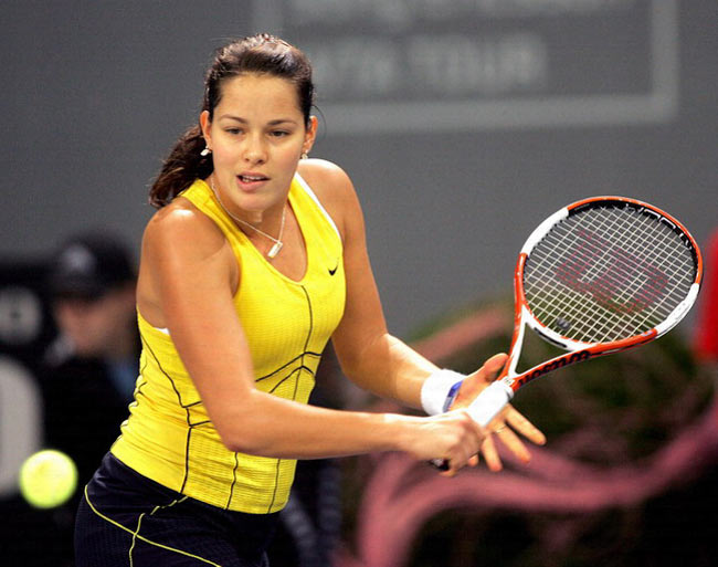 Ana Ivanovic returns a ball to Patty Schnyder of Switzerland during their semi-final tennis match at the Zurich Open WTA tennis tournament in Zurich, October 22, 2005