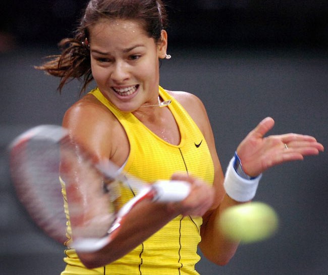 Ana Ivanovic returns a ball to Patty Schnyder of Switzerland during their semi-final tennis match at the Zurich Open WTA tennis tournament in Zurich, October 22, 2005