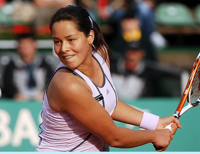 Ana Ivanovic returns the ball to Marta Domachowska from Poland during their 1st round match, 02 May 2006 in Warsaw. Ana win 6:4 7:5.