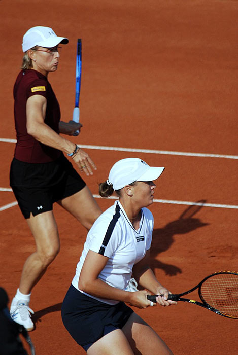 Russia's Maria Kirilenko and Ana Ivanovic beat the top-seeded pair of South Africa's Liezel Huber and the United States' Martina Navratilova 6-2, 6-4