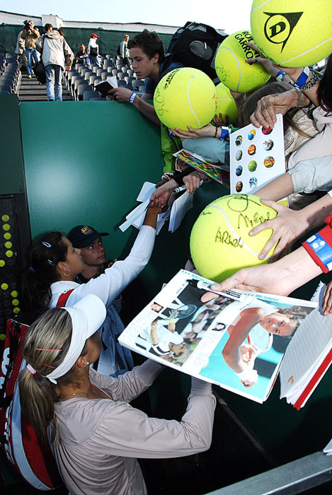 Russia's Maria Kirilenko and Ana Ivanovic beat the top-seeded pair of South Africa's Liezel Huber and the United States' Martina Navratilova 6-2, 6-4