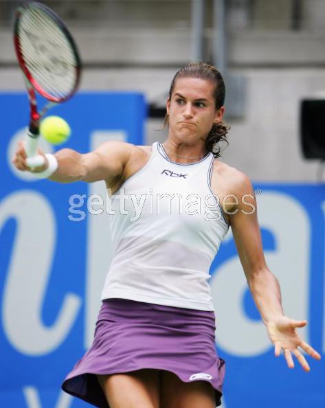 Amelie Mauresmo of France in action against Ana Ivanovic of Serbia-Montenegro during play on day three of the Medibank International held at the Sydney International Tennis Centre, January 10, 2006 in Sydney, Australia