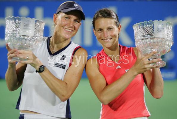 Rennae Stubbs of Australia and Corina Morariu of the USA pose with the Women's doubles trophies after defeating Virginia Ruano Pascual of Spain and Paola Suarez of Argentina during play on day six of the Medibank International held at the Sydney International Tennis Centre, January 13, 2006 in Sydney, Australia. (Photo by Chris McGrath/Getty Images) 