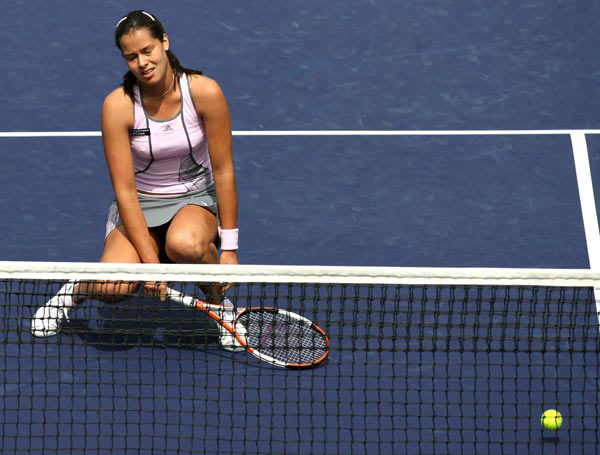 Ana Ivanovic of Serbia and Montenegro reacts during her match aganist Amelie Mauresmo of France at the Nasdaq-100 Open tennis tournament in Key Biscayne, Florida March 27, 2006