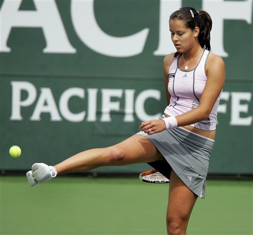 Ana Ivanovic kicks the ball in frustration during her quarterfinal match against Elena Dementieva at the Pacific Life Tennis Open in Indian Wells, Calif. Thursday, March 16, 2006