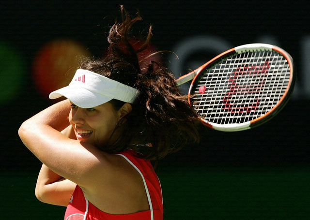 Ana Ivanovic of Serbia and Montenegro hits a backhand in her second round match against Samantha Stosur of Australia during day four of the Australian Open at Melbourne Park January 19, 2006 in Melbourne, Australia. 